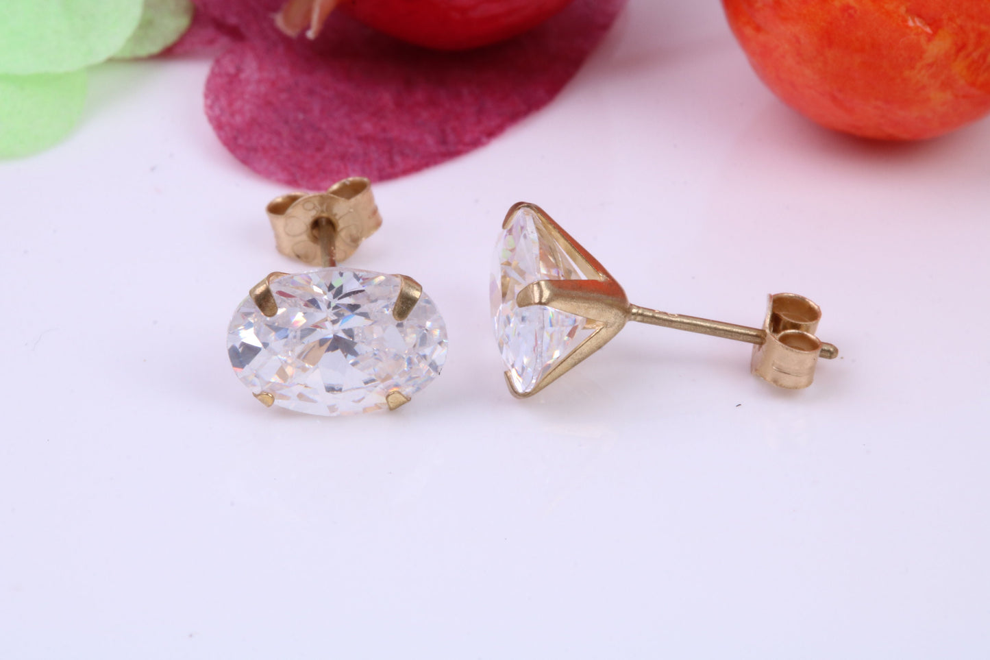 Oval cut Cubic Zirconia set Stud Earrings, Measures 8 x 6 mm, Made from Solid 9ct Yellow Gold