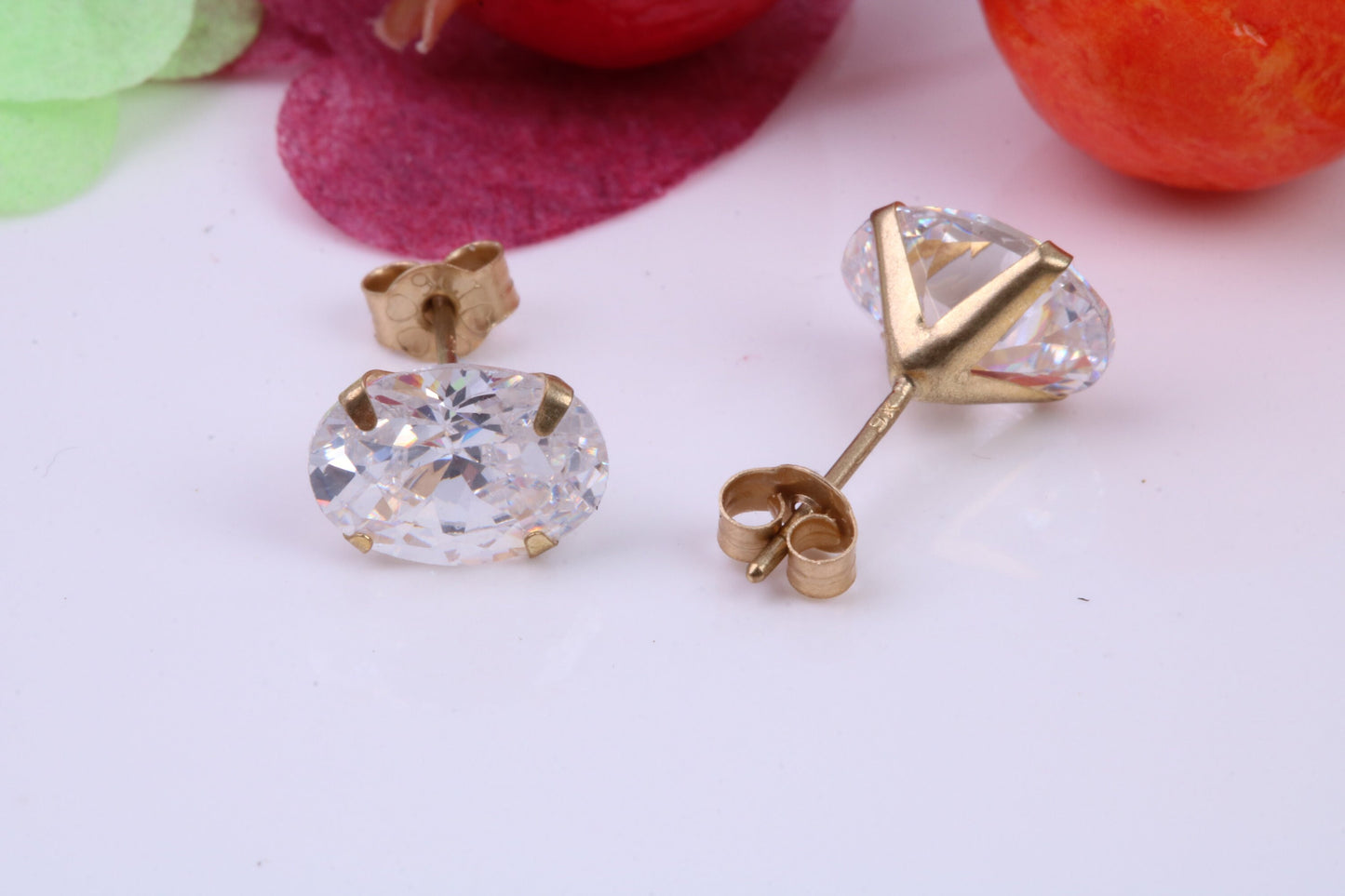 Oval cut Cubic Zirconia set Stud Earrings, Measures 8 x 6 mm, Made from Solid 9ct Yellow Gold