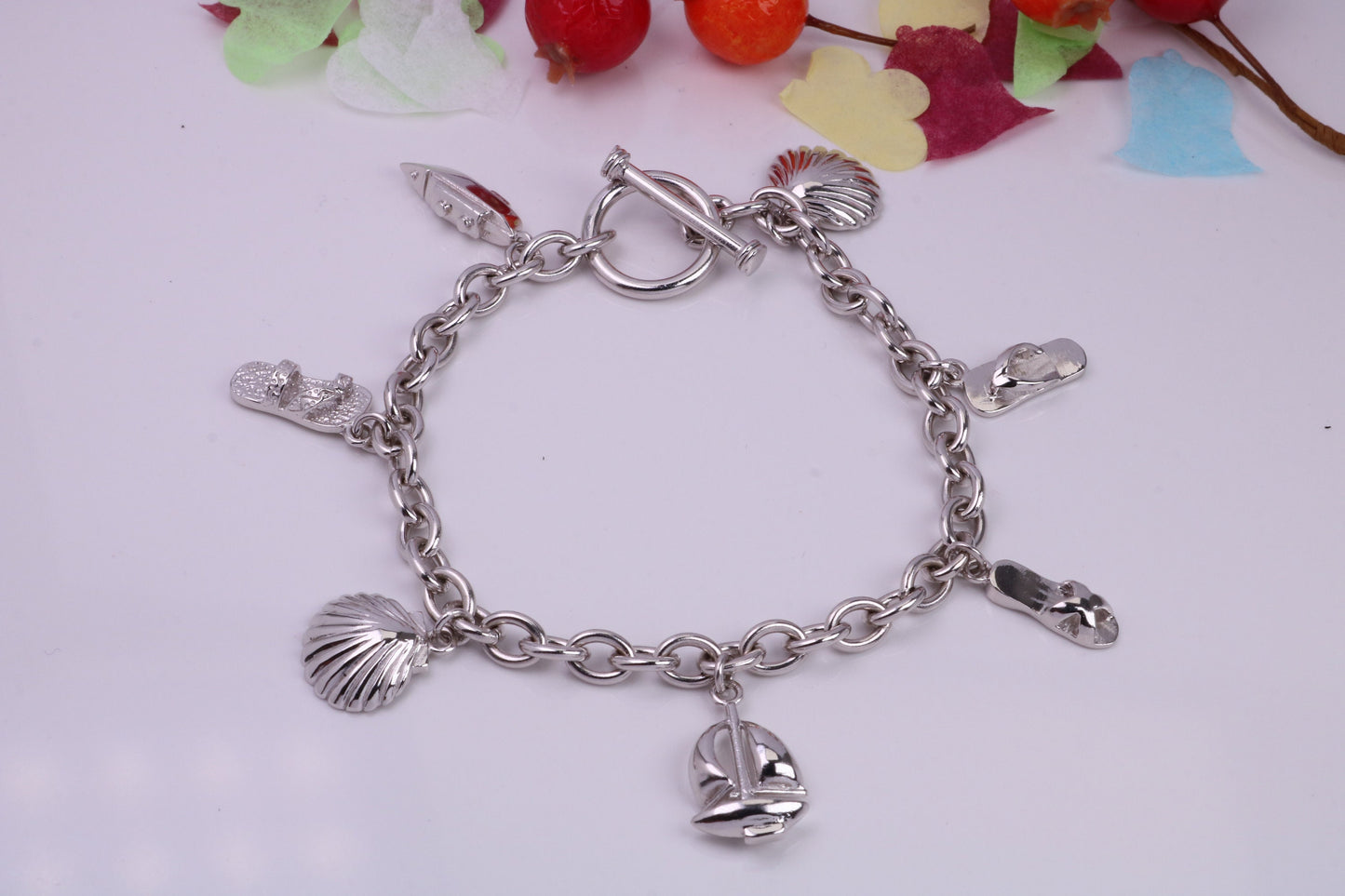 Ready to Wear Charms Bracelet, With Seven Charms Attached, Made from solid Sterling Silver, 7.50 Inches Long, Good Weighty Feel