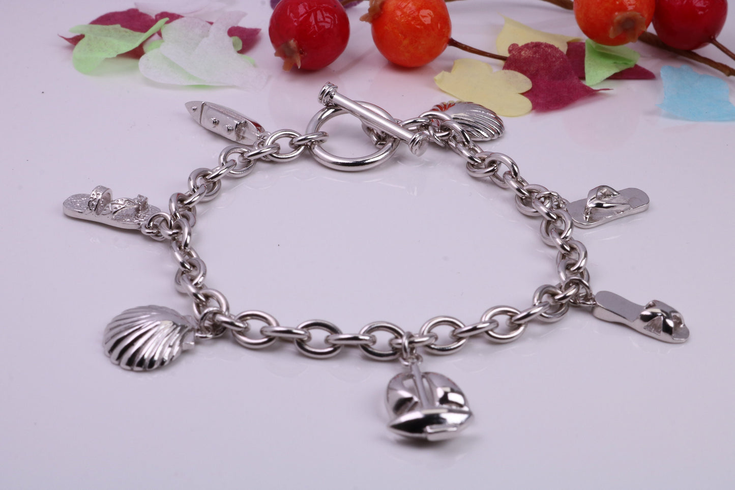 Ready to Wear Charms Bracelet, With Seven Charms Attached, Made from solid Sterling Silver, 7.50 Inches Long, Good Weighty Feel