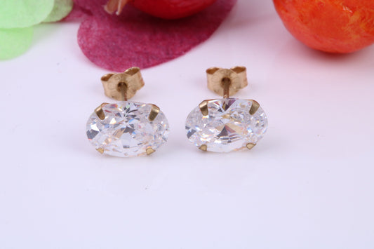 Oval cut Cubic Zirconia set Stud Earrings, Measures 8 x 6 mm, Made from Solid 9ct Yellow Gold