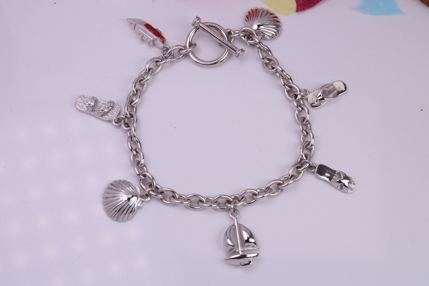 Ready to Wear Charms Bracelet, With Seven Charms Attached, Made from solid Sterling Silver, 7.50 Inches Long, Good Weighty Feel