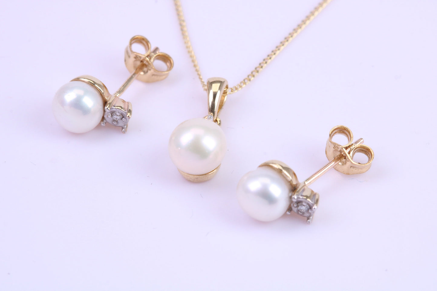 Real Pearl Necklace and Matching Earrings set in Solid Yellow Gold Together with 18 Inch Yellow Gold Chain