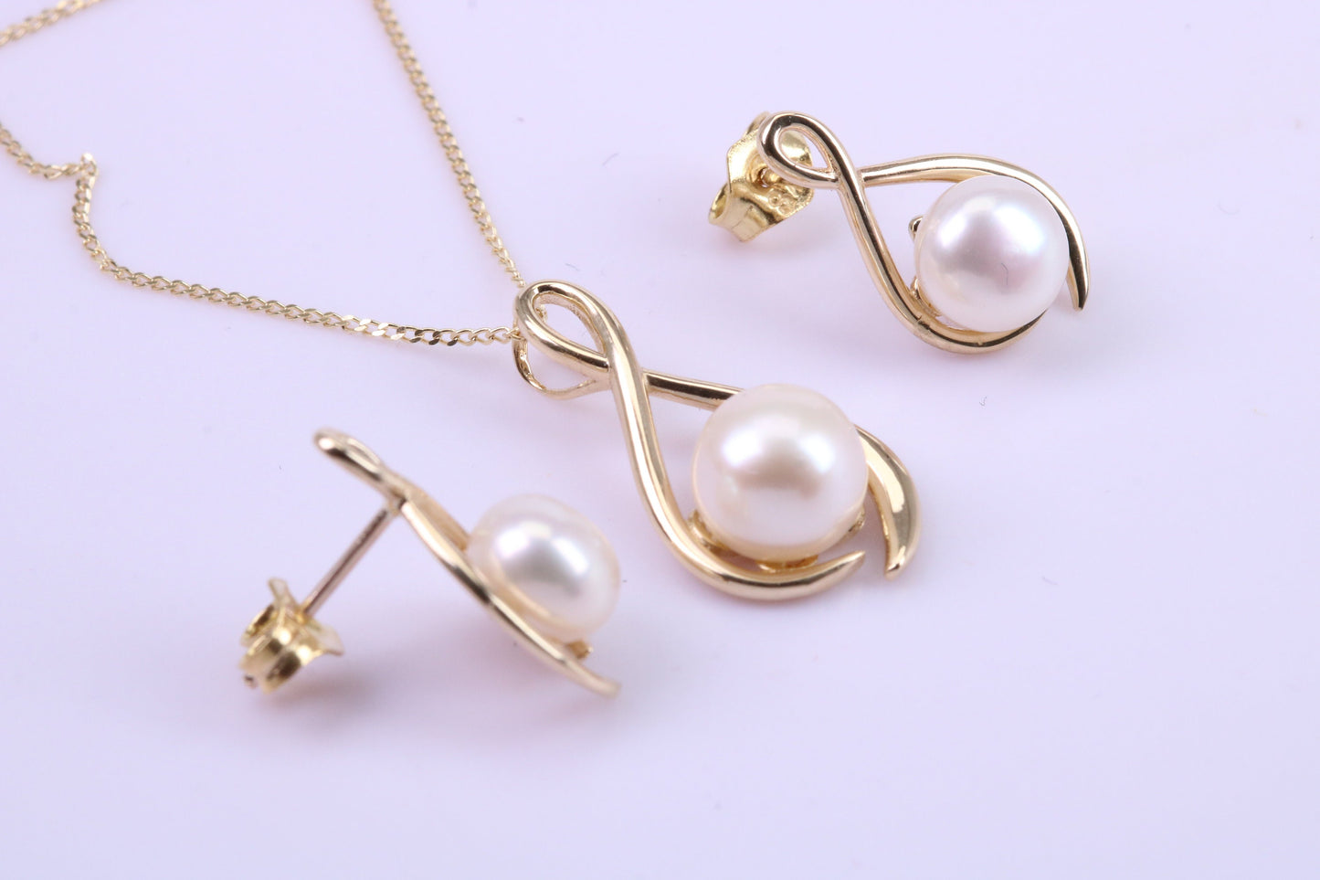 Real Pearl Necklace and Matching Earrings set in Solid Yellow Gold Together with 18 Inch Yellow Gold Chain