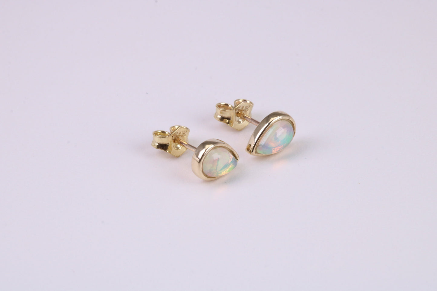 Natural Teardrop cut Opal set Stud Earrings Made from Solid Yellow Gold