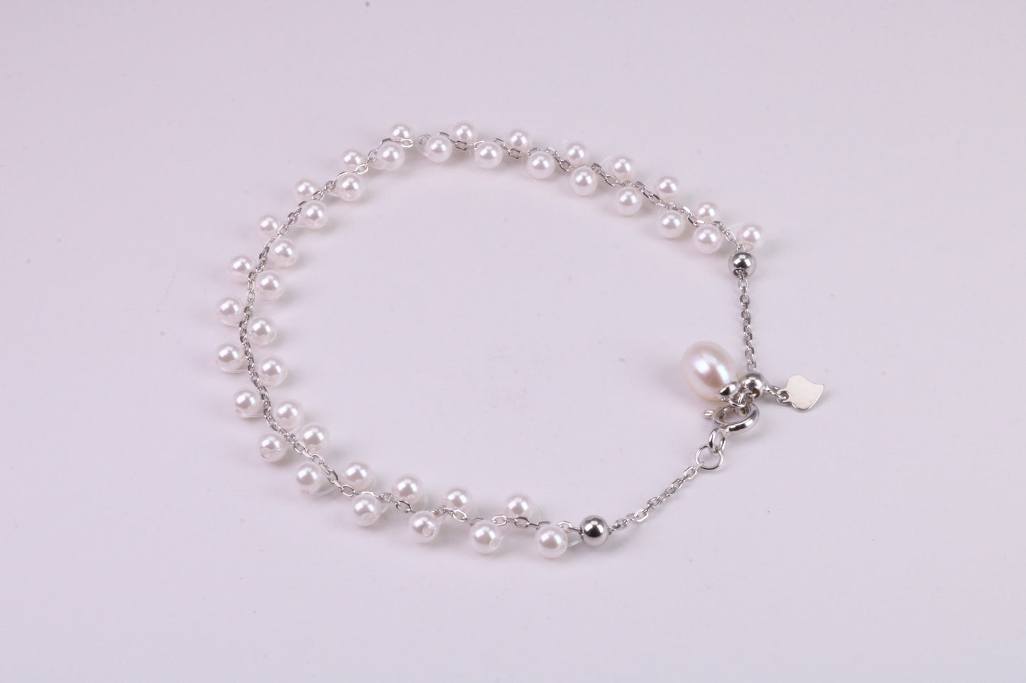 Natural 7.50 inches Long x 7 mm Wide Pearl Bracelet, made from Sterling Silver