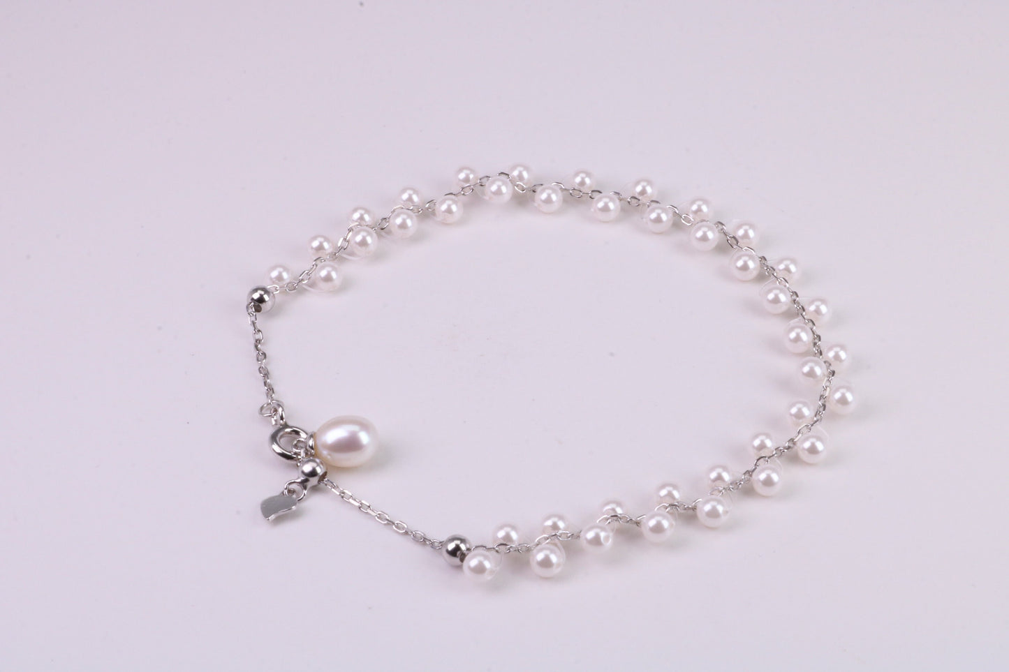 Natural 7.50 inches Long x 7 mm Wide Pearl Bracelet, made from Sterling Silver