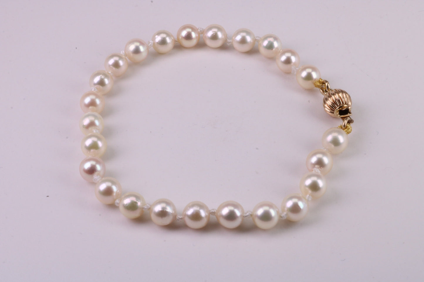 South Sea Simple 6 mm Round Natural Pearl Bracelet set with Solid Yellow Gold Lock