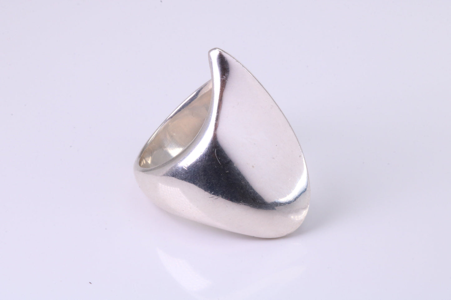 Large Abstract ring, made from solid cast sterling silver, very smooth and fluid lines with high polished finish