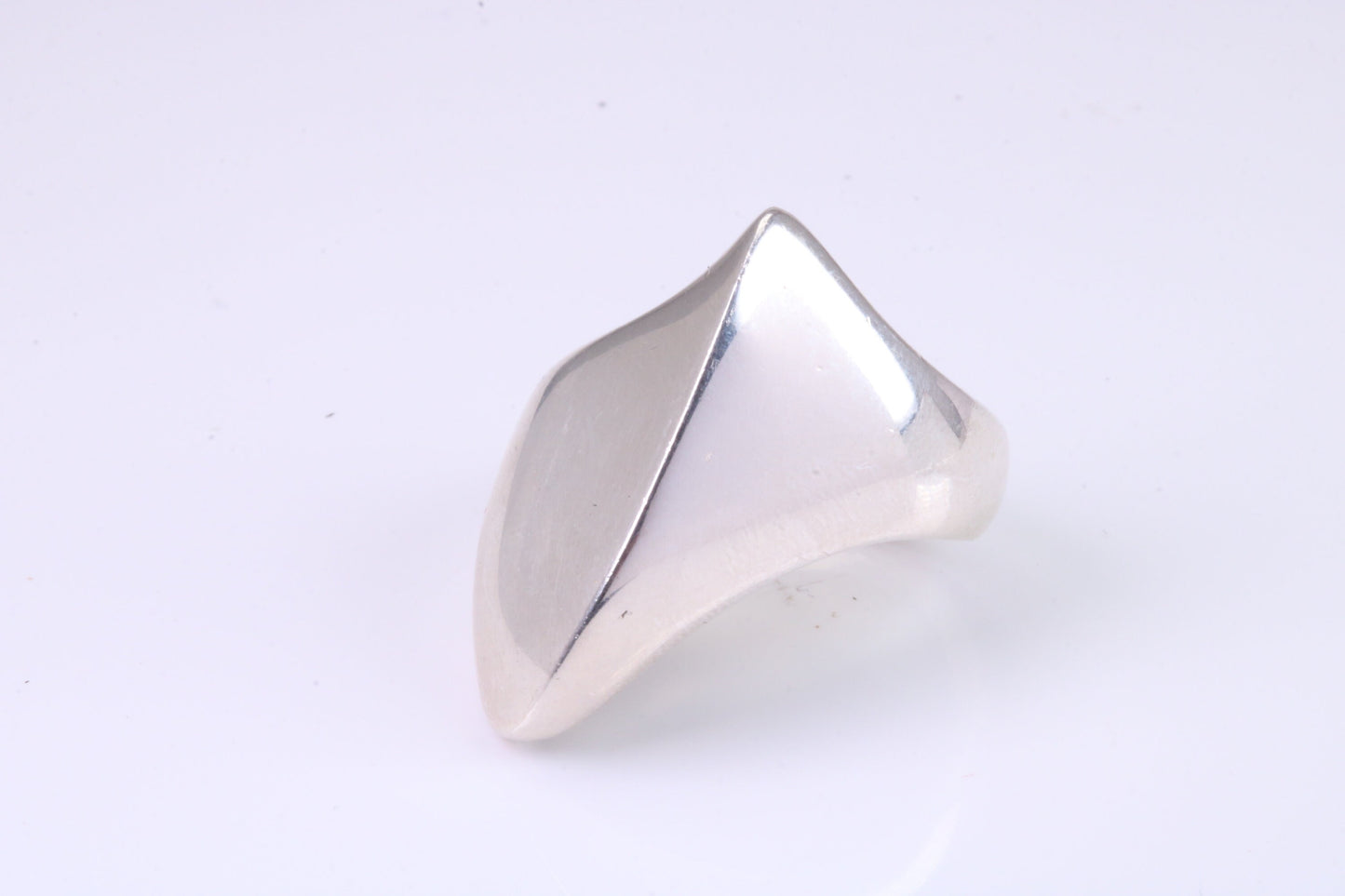 Large Abstract ring, made from solid cast sterling silver, very smooth and fluid lines with high polished finish