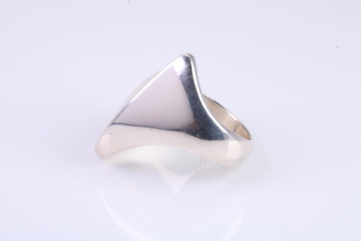 Large Abstract ring, made from solid cast sterling silver, very smooth and fluid lines with high polished finish