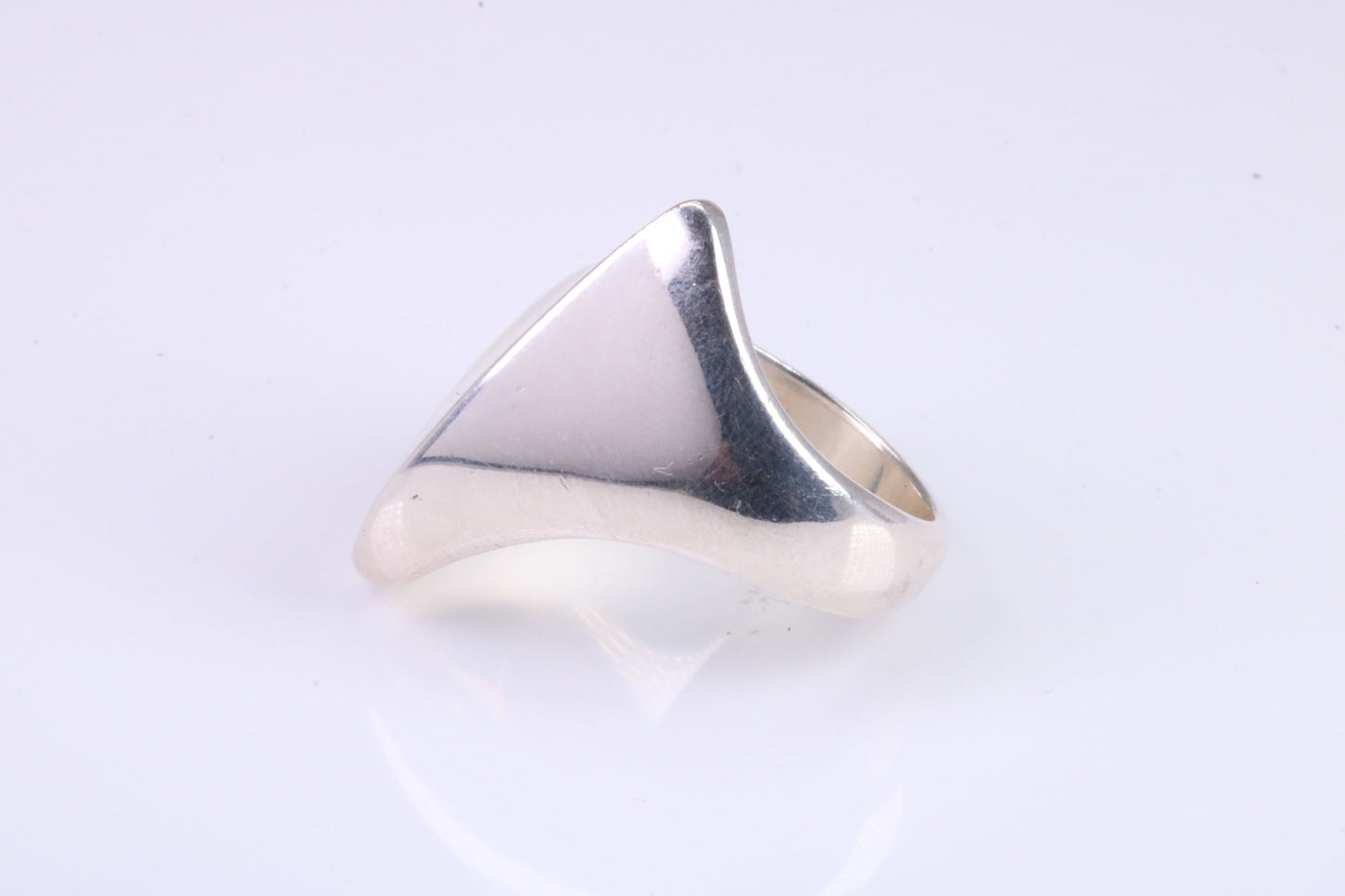 Large Abstract ring, made from solid cast sterling silver, very smooth and fluid lines with high polished finish