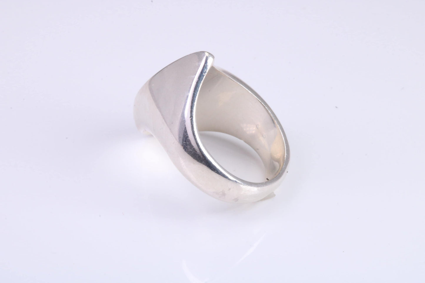 Large Abstract ring, made from solid cast sterling silver, very smooth and fluid lines with high polished finish