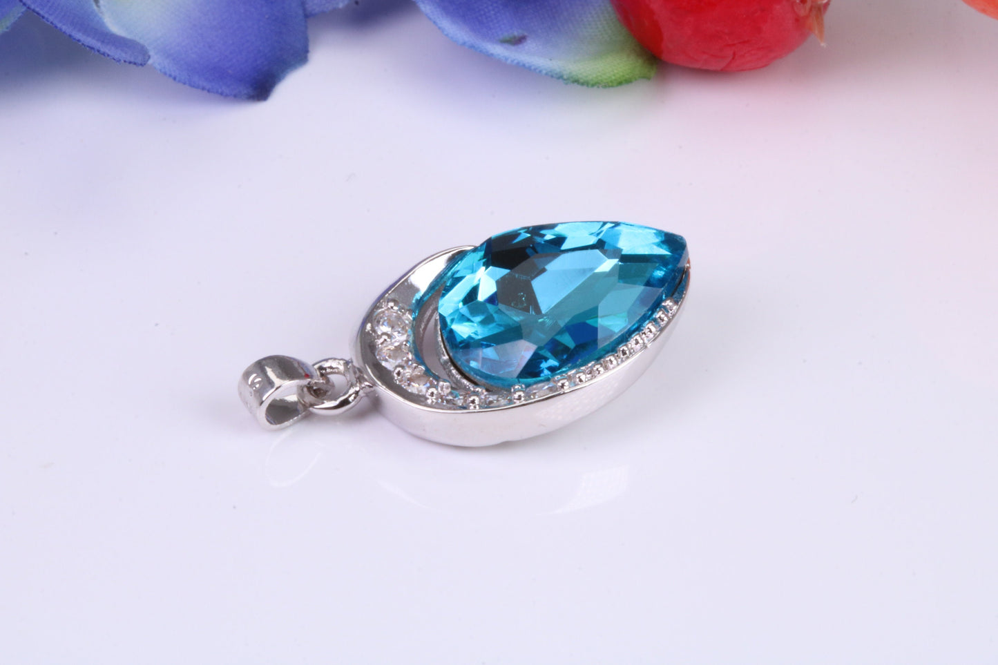 Sterling Silver with Real Blue Topaz and C Z set Pendant