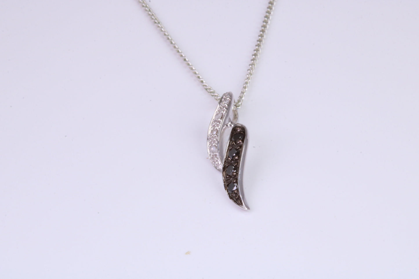 Black and White Natural Diamonds set solid White Gold Pendant with 18 inch long Chain