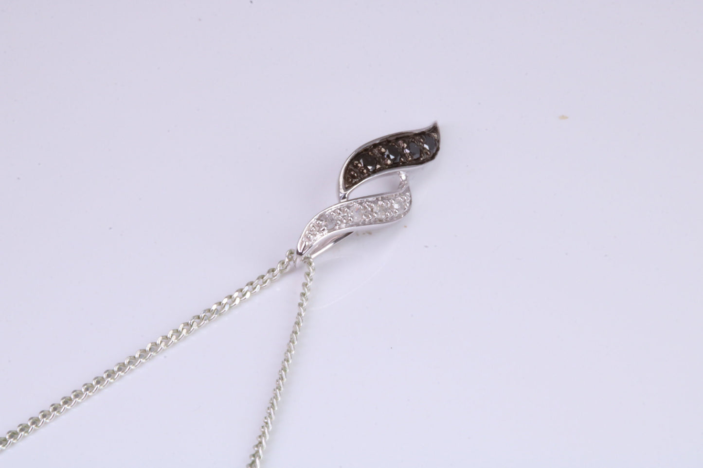 Black and White Natural Diamonds set solid White Gold Pendant with 18 inch long Chain