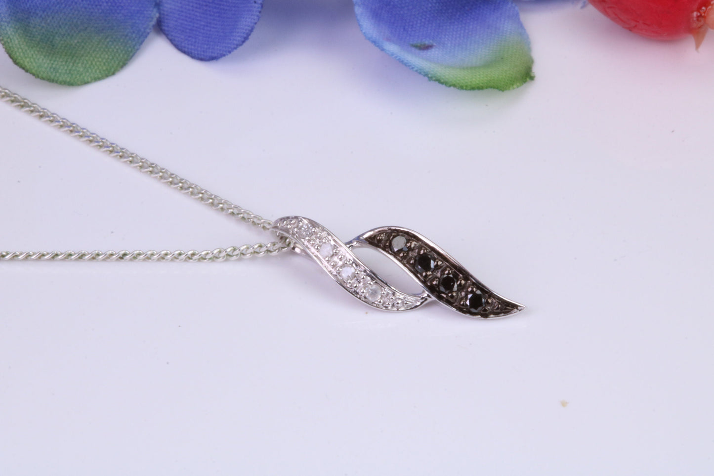 Black and White Natural Diamonds set solid White Gold Pendant with 18 inch long Chain