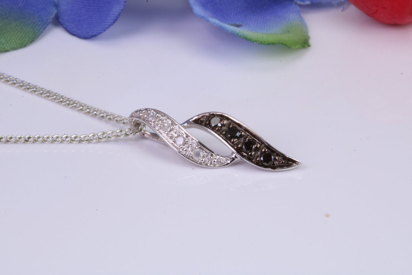 Black and White Natural Diamonds set solid White Gold Pendant with 18 inch long Chain