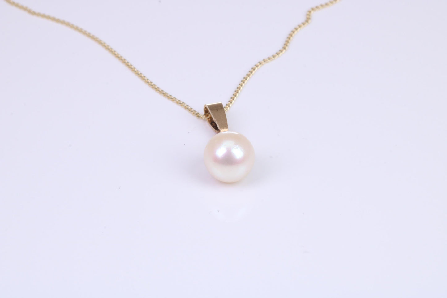 7 mm Round Natural Cultured Pearl Necklace set in Solid Yellow Gold Together with 16 Inch Yellow Gold Chain