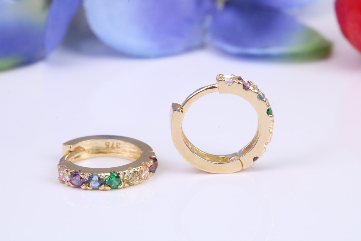 10 mm round hinged hoop earrings, made from solid yellow gold and set with Rainbow Coloured Cubic Zirconia