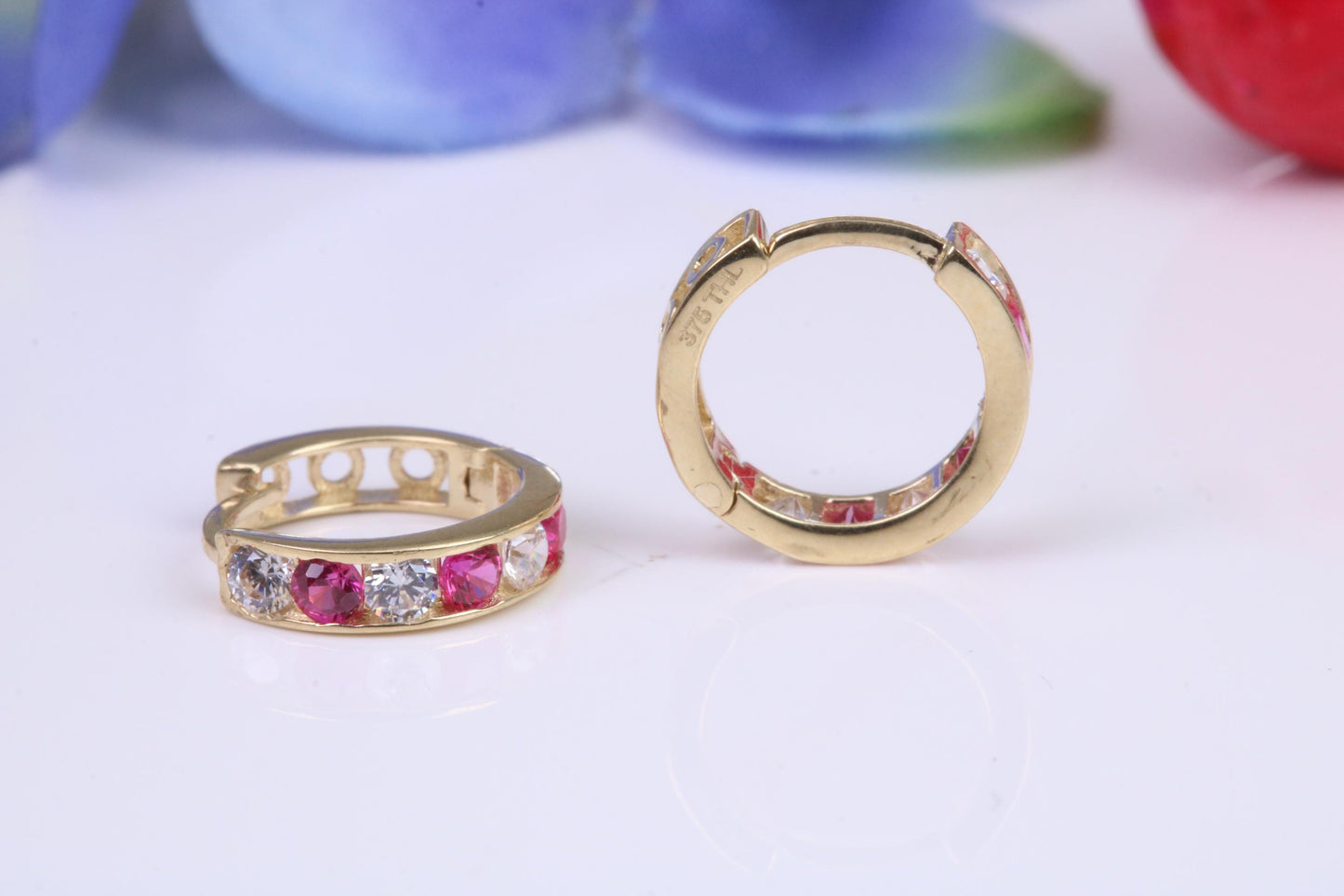 10 mm round hinged hoop earrings, made from solid yellow gold and set with Ruby and Diamond Cubic Zirconia