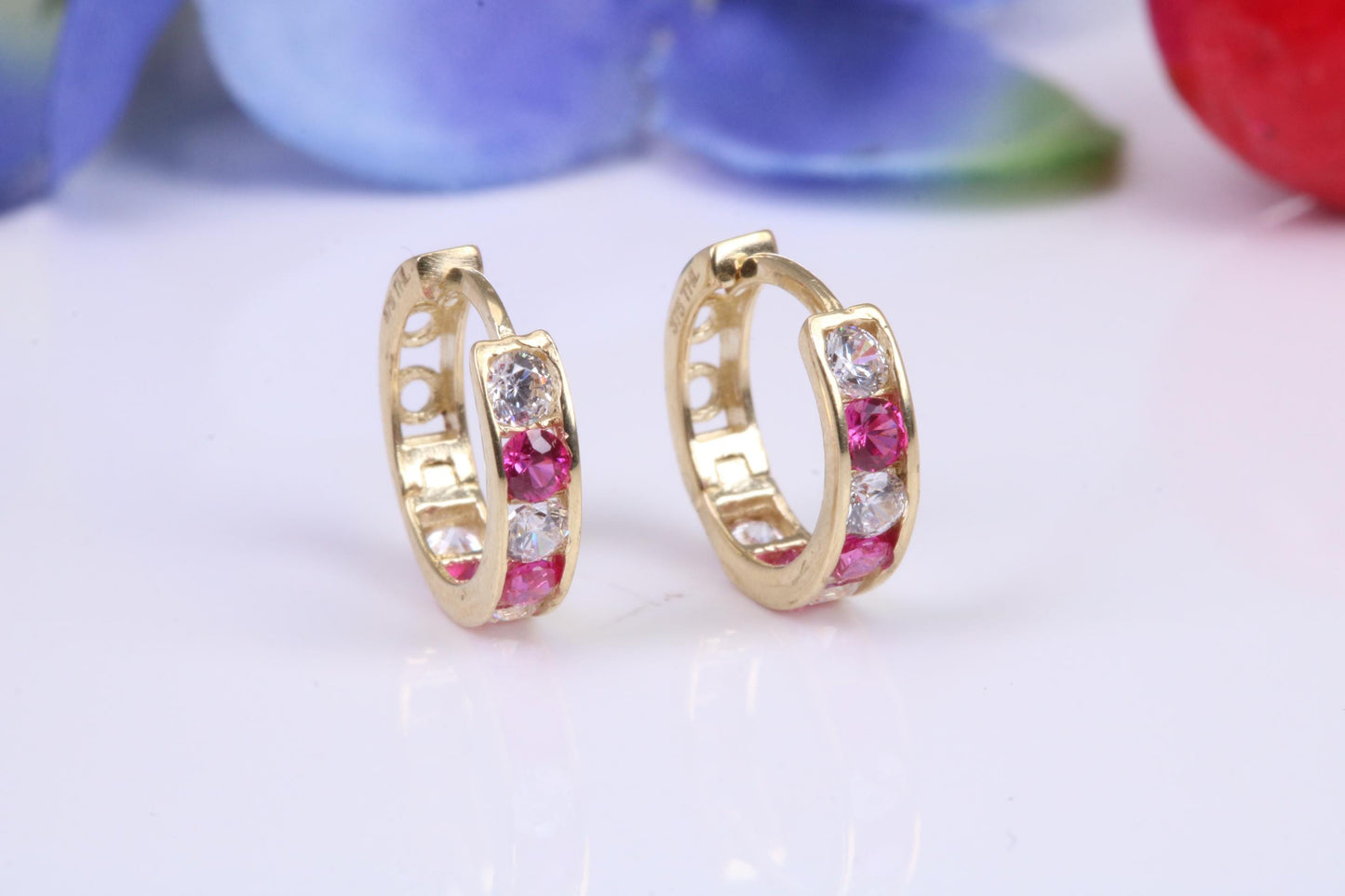 10 mm round hinged hoop earrings, made from solid yellow gold and set with Ruby and Diamond Cubic Zirconia