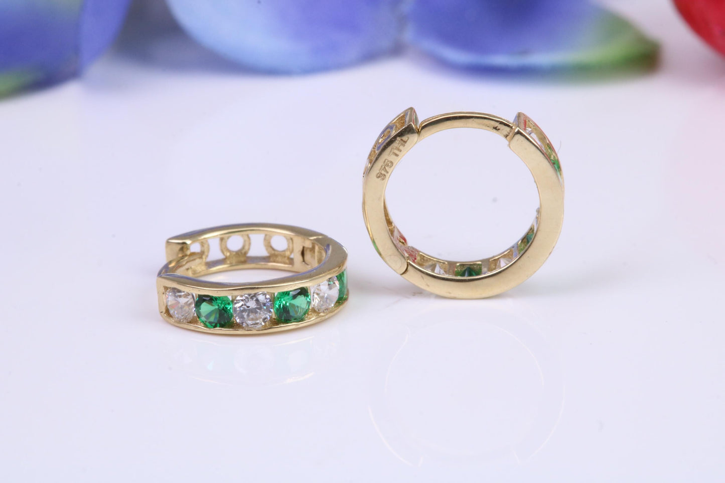 10 mm round hinged hoop earrings, made from solid yellow gold and set with Emerald and Diamond Cubic Zirconia