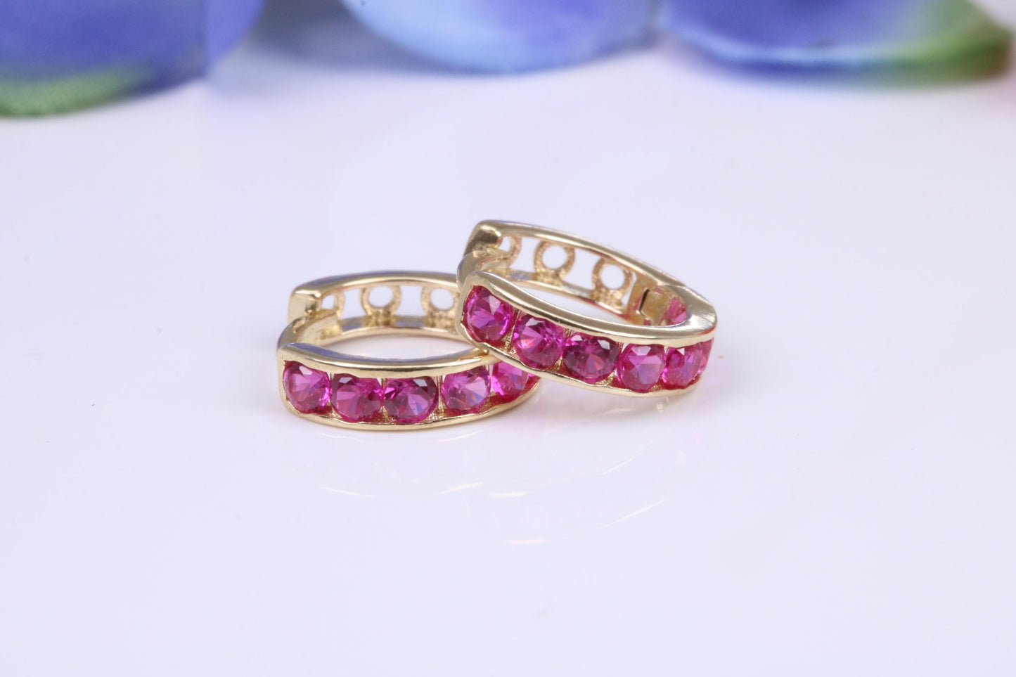 10 mm round hinged hoop earrings, made from solid yellow gold and set with Ruby Red Cubic Zirconia