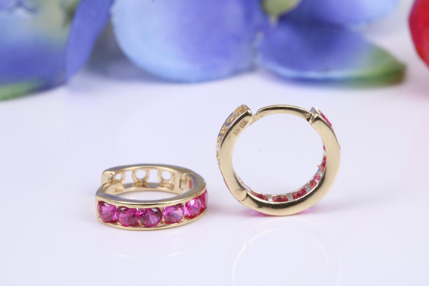 10 mm round hinged hoop earrings, made from solid yellow gold and set with Ruby Red Cubic Zirconia