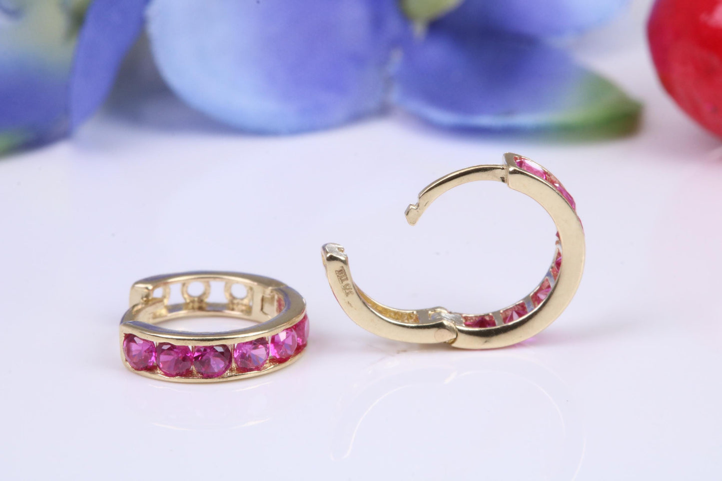 10 mm round hinged hoop earrings, made from solid yellow gold and set with Ruby Red Cubic Zirconia