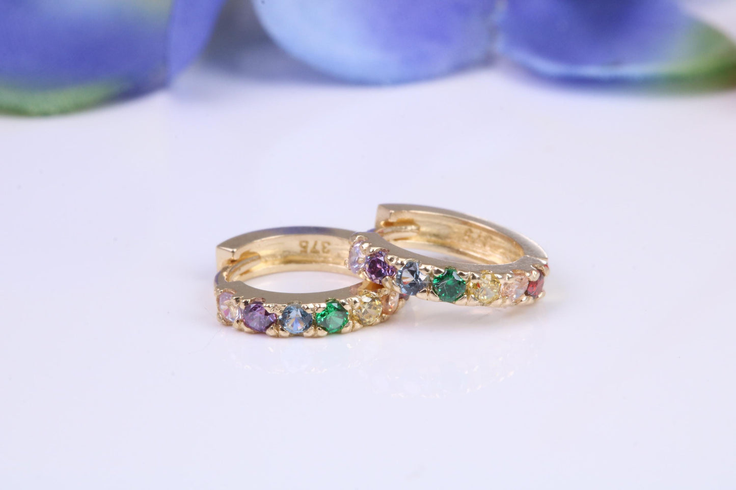 10 mm round hinged hoop earrings, made from solid yellow gold and set with Rainbow Coloured Cubic Zirconia