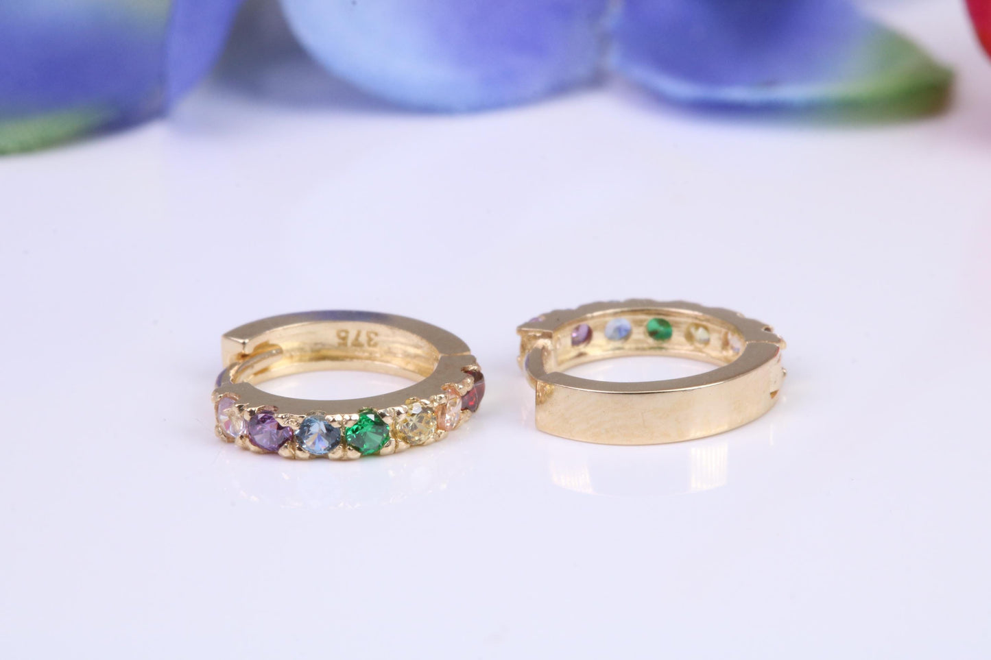 10 mm round hinged hoop earrings, made from solid yellow gold and set with Rainbow Coloured Cubic Zirconia