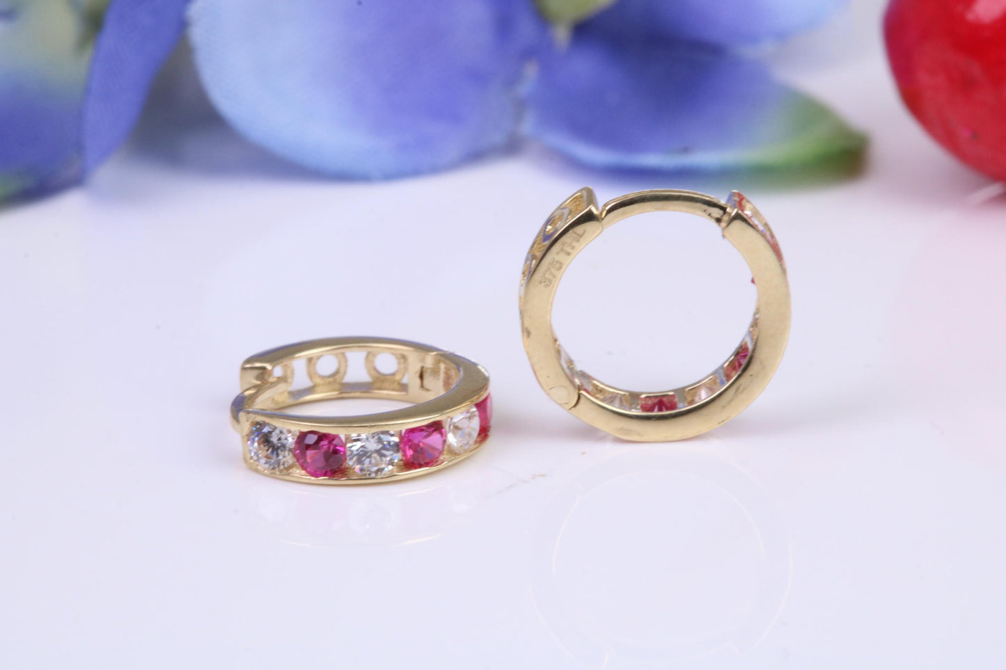 10 mm round hinged hoop earrings, made from solid yellow gold and set with Ruby and Diamond Cubic Zirconia