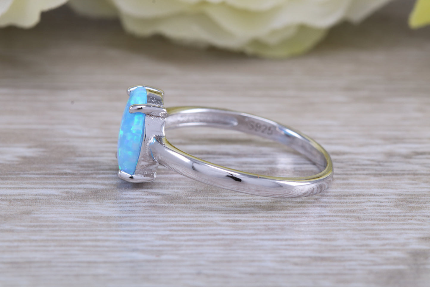 Very sparkly and fiery Opal solitaire, solid sterling silver ring further rhodium plated for that platinum look