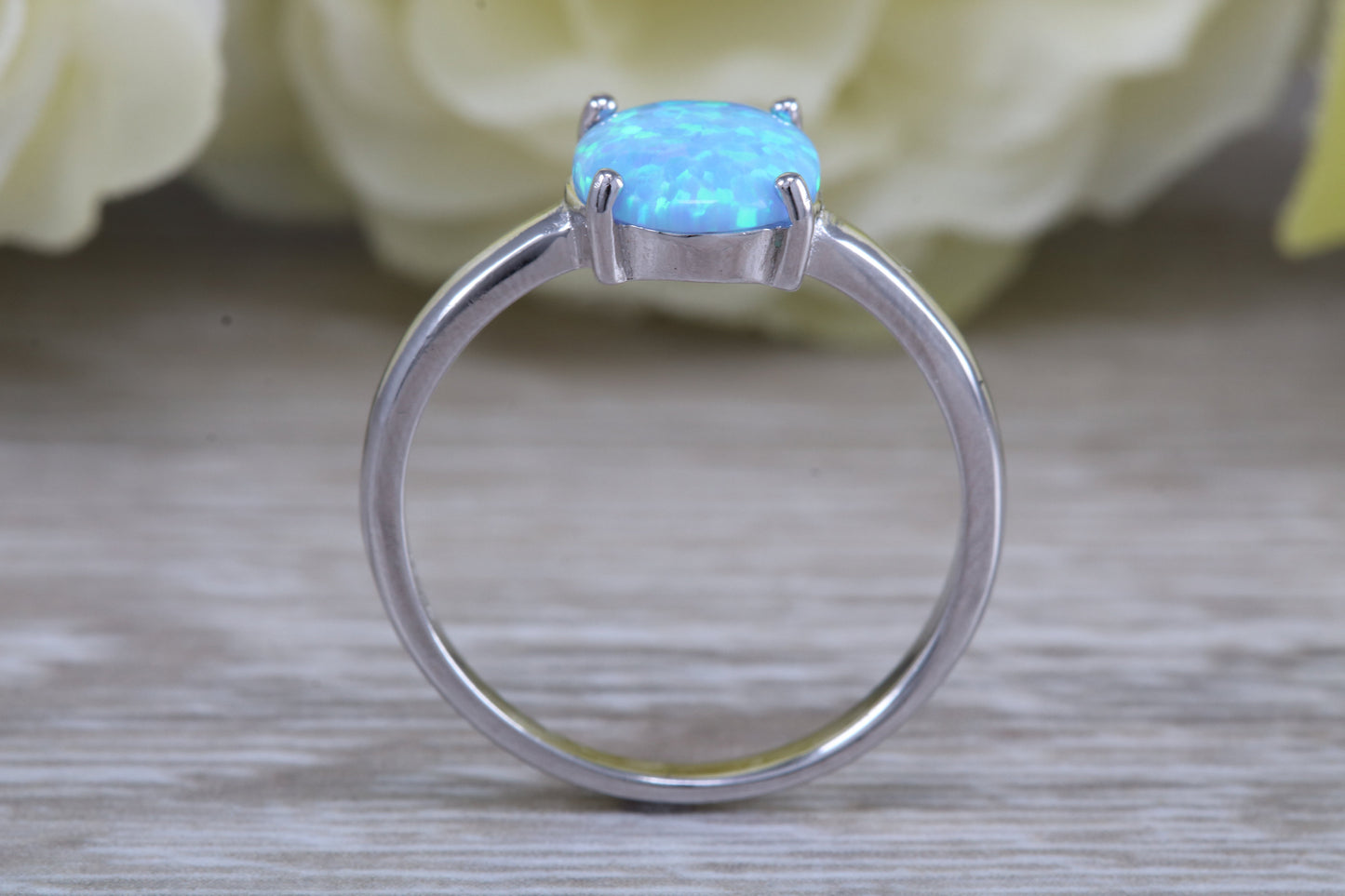 Very sparkly and fiery Opal solitaire, solid sterling silver ring further rhodium plated for that platinum look