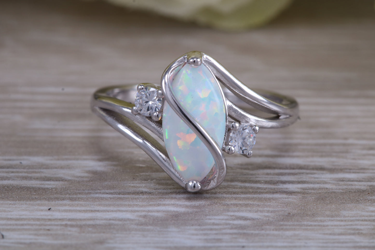 Very sparkly and fiery Opal and cubic zirconia set dress ring, solid sterling silver ring further rhodium plated for that platinum look