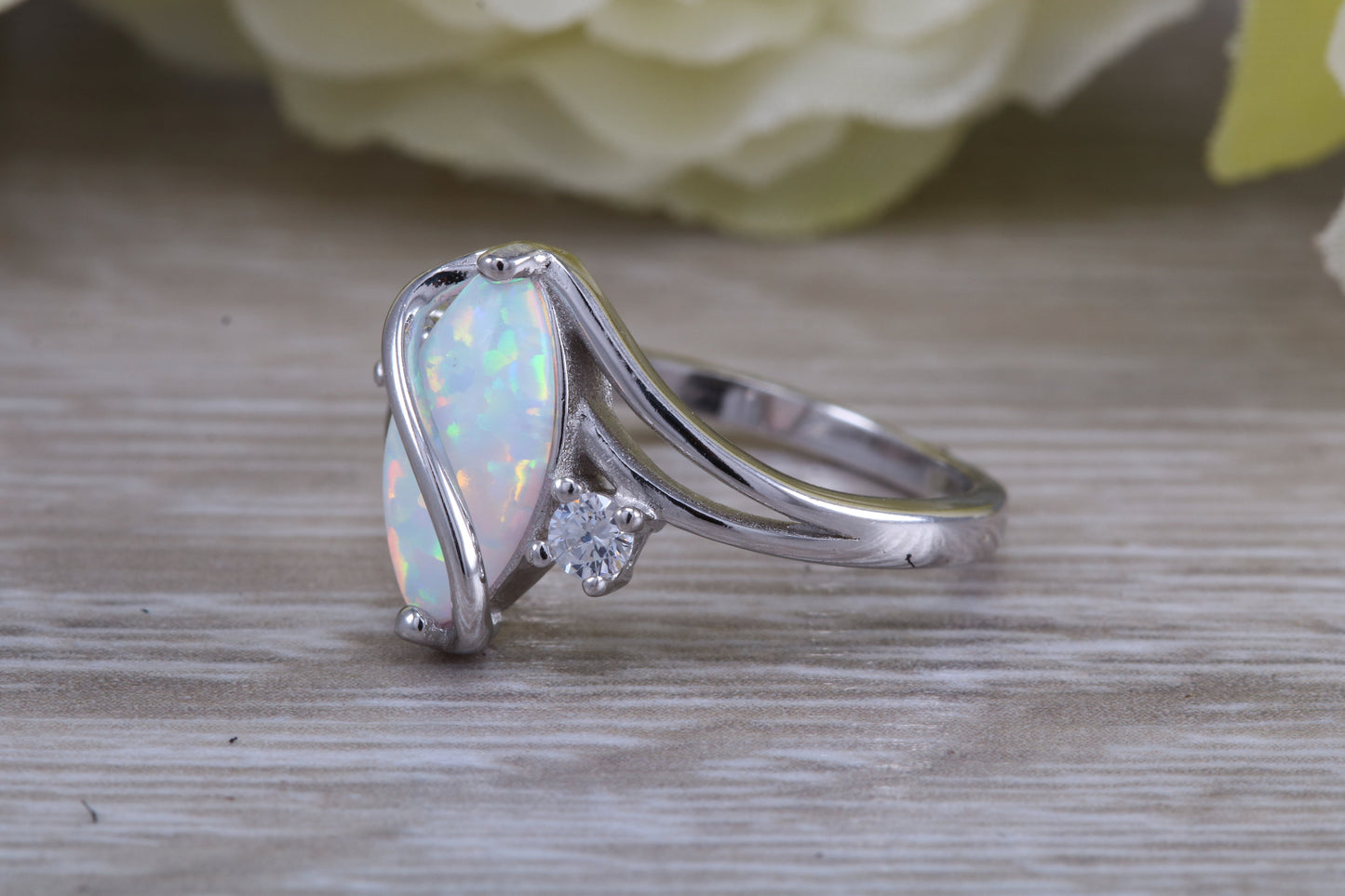 Very sparkly and fiery Opal and cubic zirconia set dress ring, solid sterling silver ring further rhodium plated for that platinum look