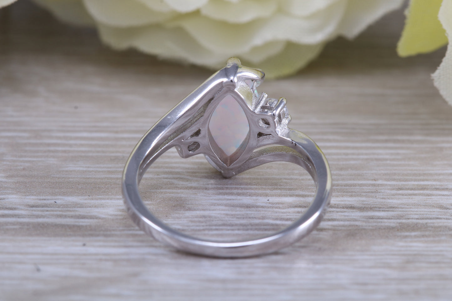 Very sparkly and fiery Opal and cubic zirconia set dress ring, solid sterling silver ring further rhodium plated for that platinum look