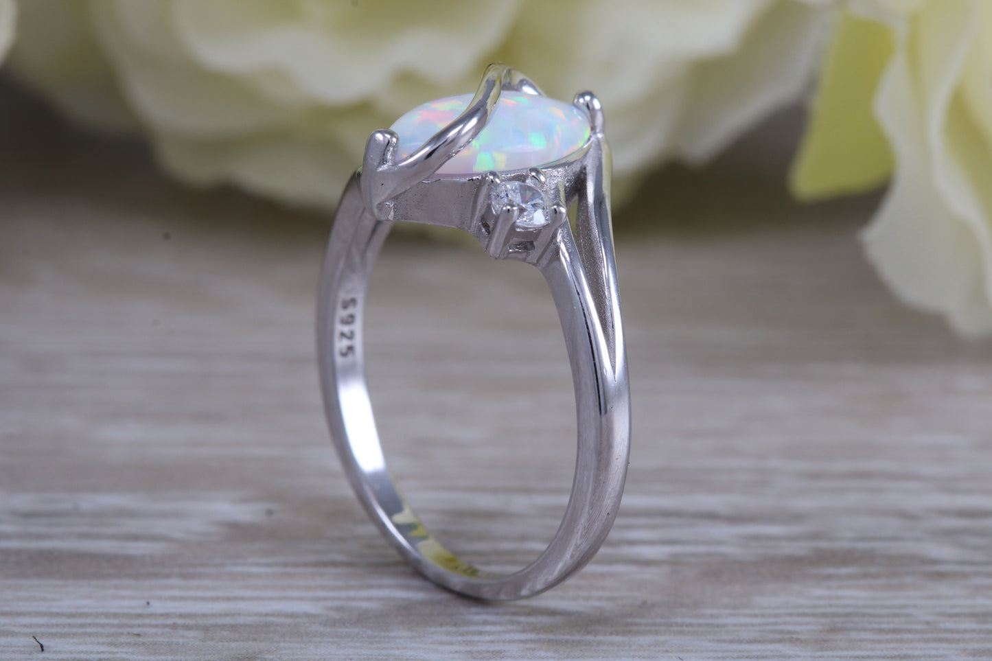 Very sparkly and fiery Opal and cubic zirconia set dress ring, solid sterling silver ring further rhodium plated for that platinum look