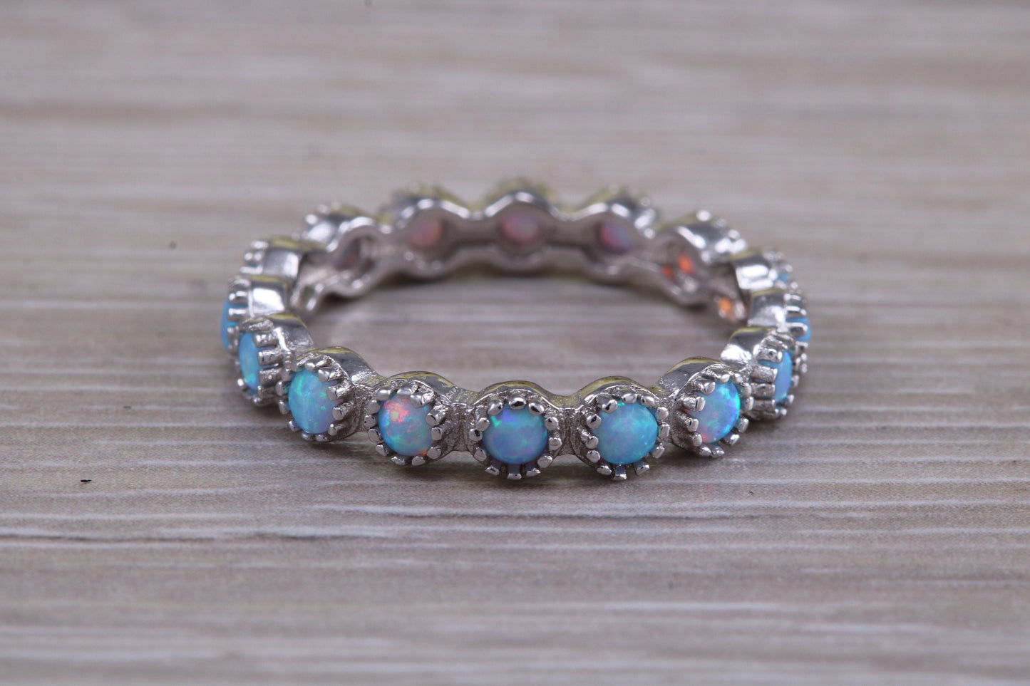Very sparkly and fiery Opal full circle set ring, solid sterling silver ring further rhodium plated for that platinum look