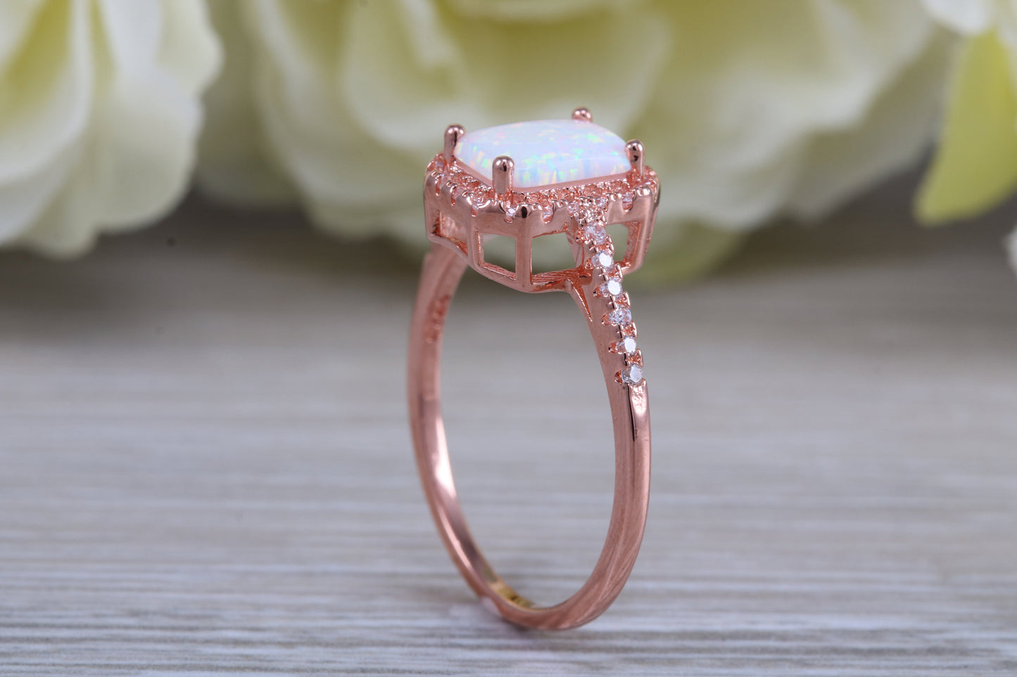 Very sparkly and fiery Opal and cubic zirconia set dress ring, solid sterling silver ring further 18ct rose gold plated