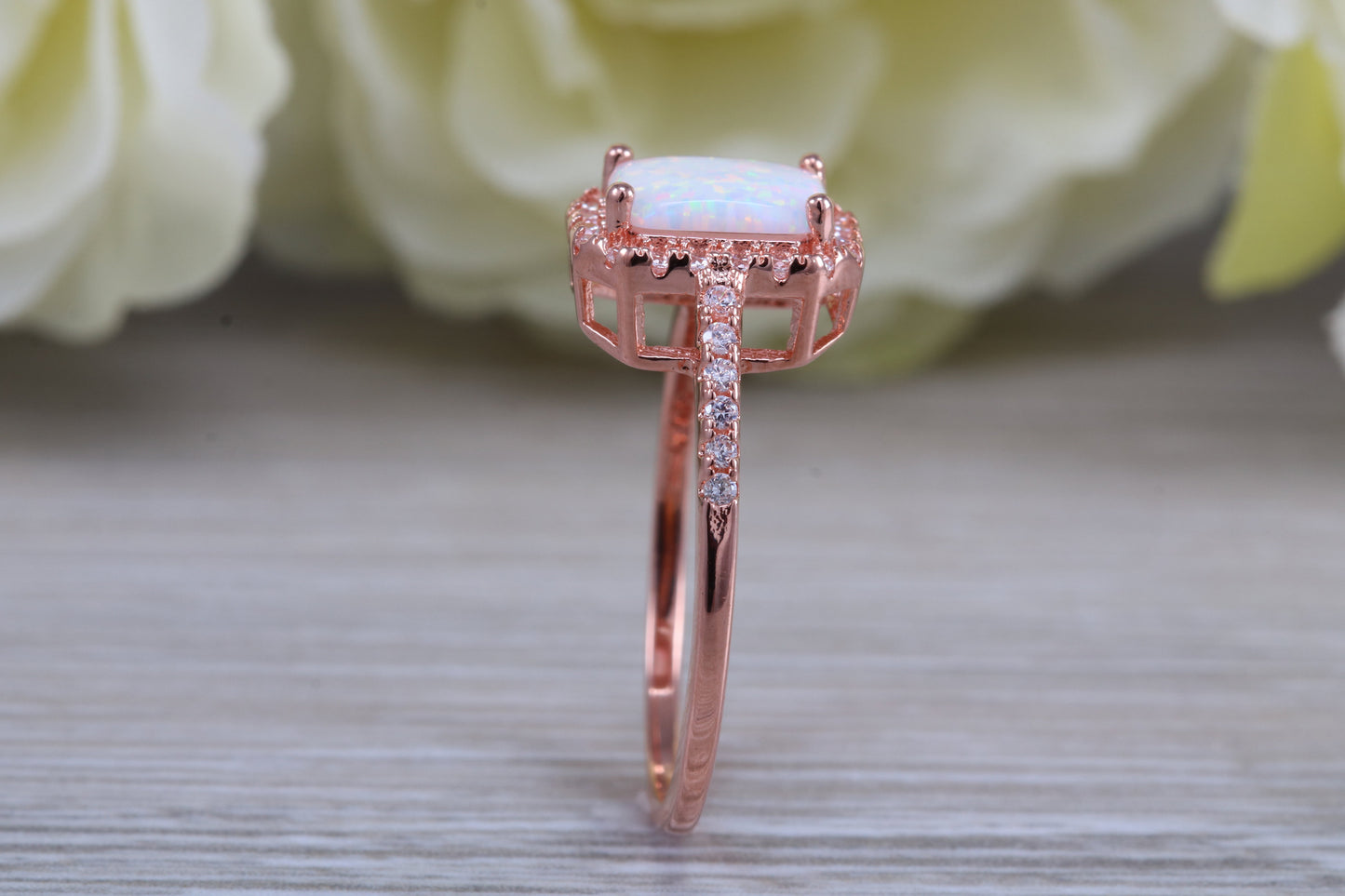 Very sparkly and fiery Opal and cubic zirconia set dress ring, solid sterling silver ring further 18ct rose gold plated
