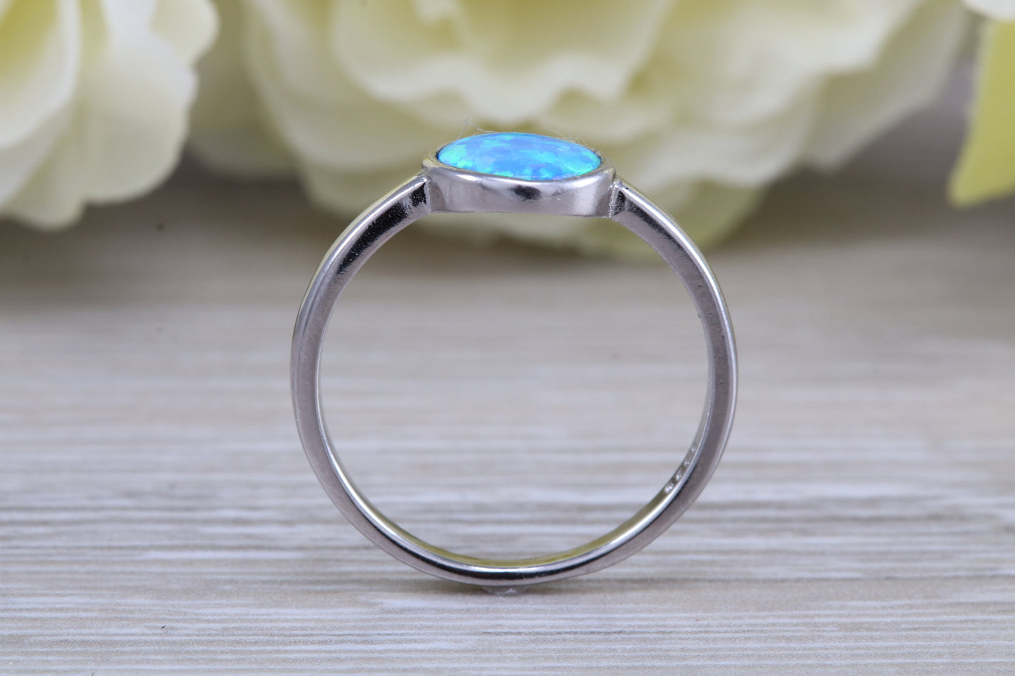 Fiery Blue Opal solitaire ring, solid sterling silver ring further rhodium plated for that platinum look