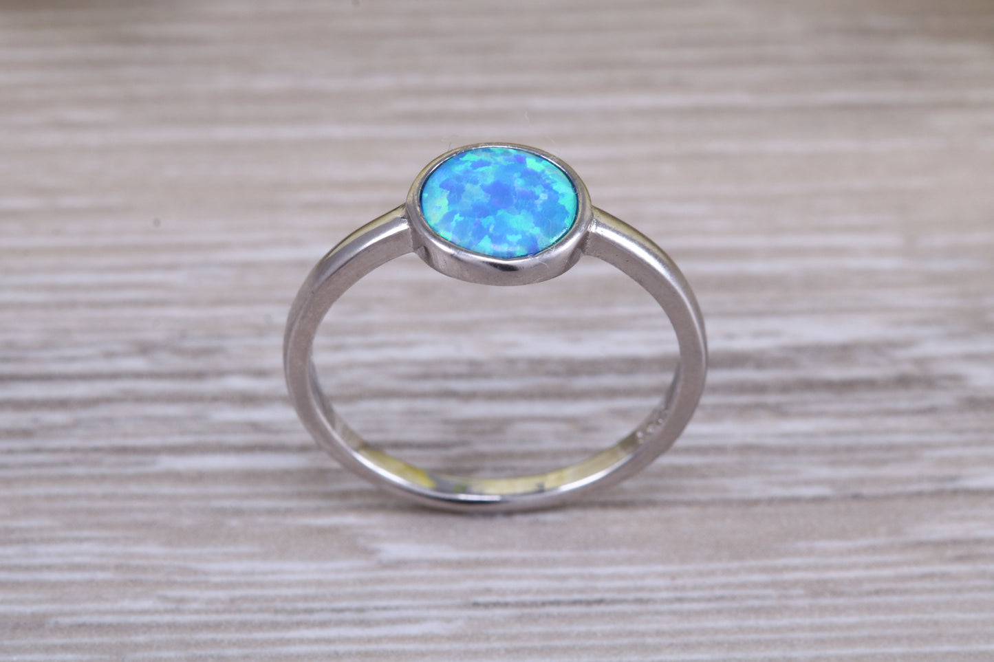 Fiery Blue Opal solitaire ring, solid sterling silver ring further rhodium plated for that platinum look
