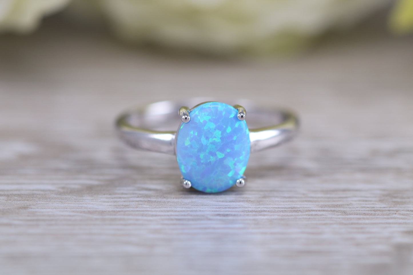 Very sparkly and fiery Opal solitaire, solid sterling silver ring further rhodium plated for that platinum look