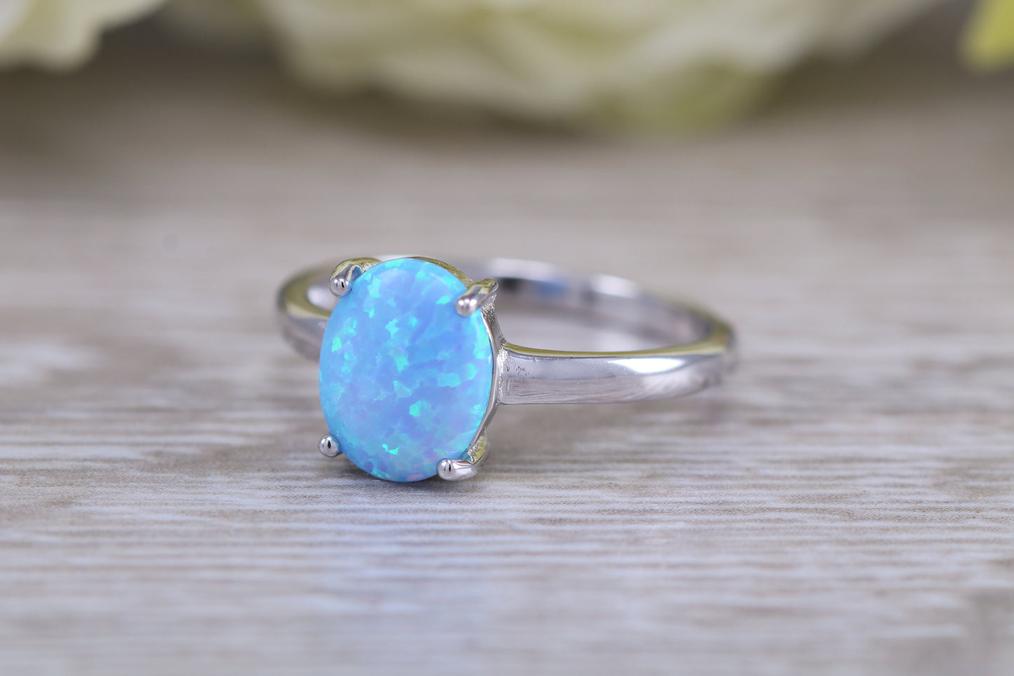 Very sparkly and fiery Opal solitaire, solid sterling silver ring further rhodium plated for that platinum look