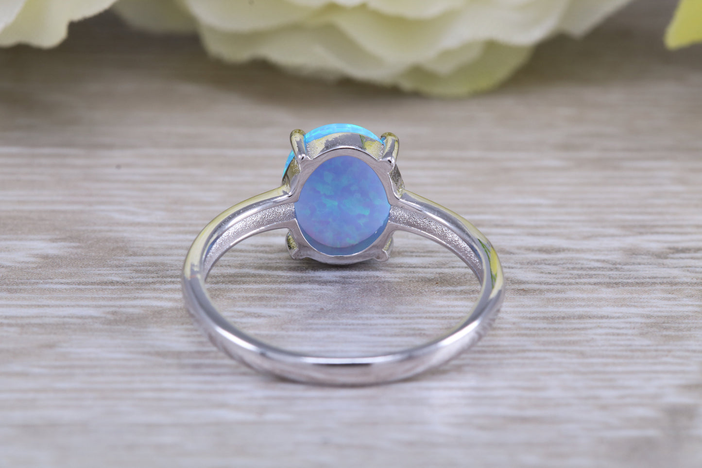 Very sparkly and fiery Opal solitaire, solid sterling silver ring further rhodium plated for that platinum look