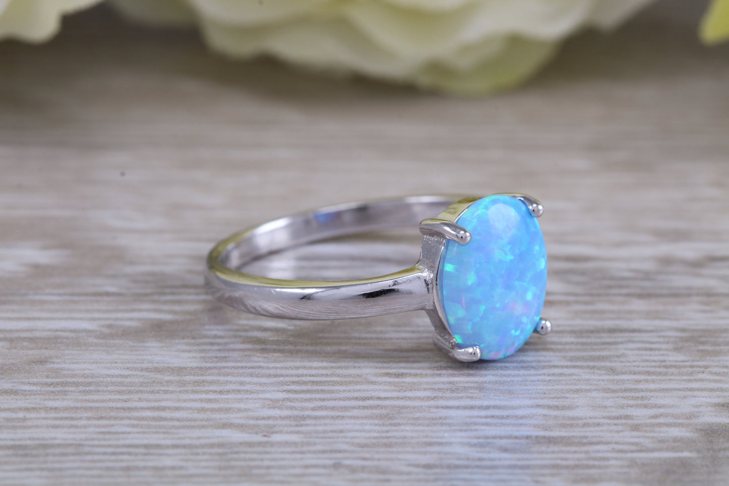 Very sparkly and fiery Opal solitaire, solid sterling silver ring further rhodium plated for that platinum look