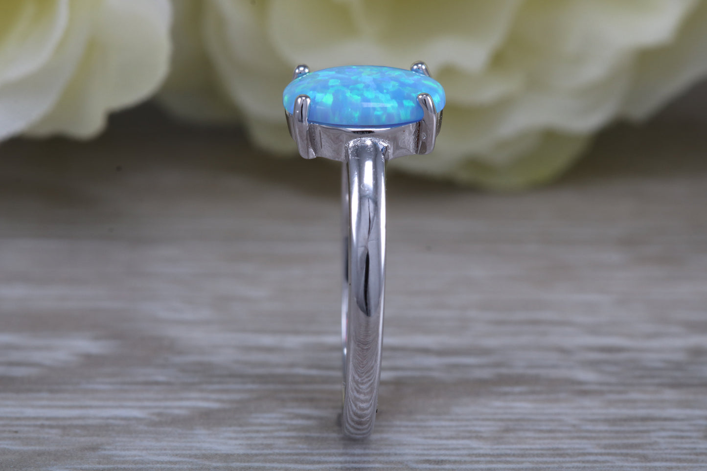Very sparkly and fiery Opal solitaire, solid sterling silver ring further rhodium plated for that platinum look