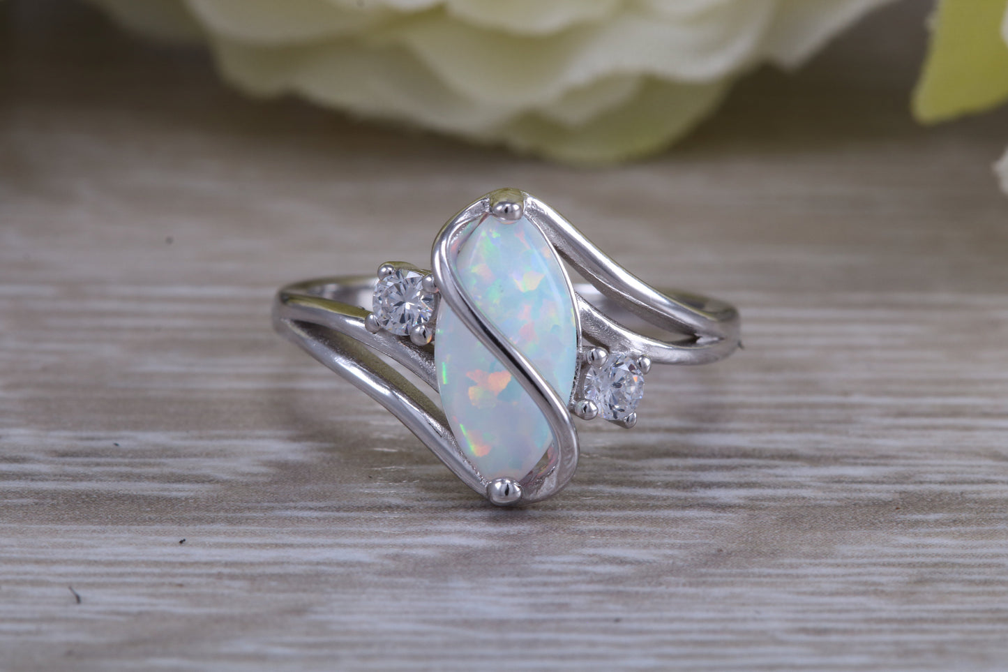 Very sparkly and fiery Opal and cubic zirconia set dress ring, solid sterling silver ring further rhodium plated for that platinum look